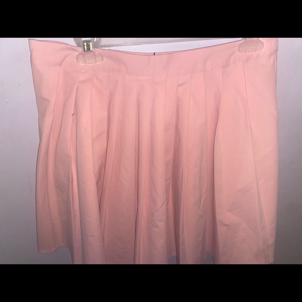 I am selling a bubblegum pink peach skater skirt